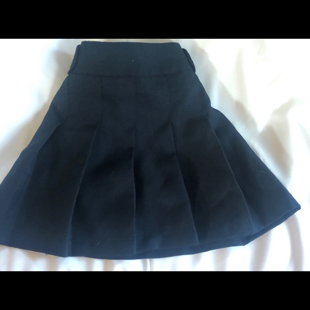 Approved school wear - navy pleated skirt